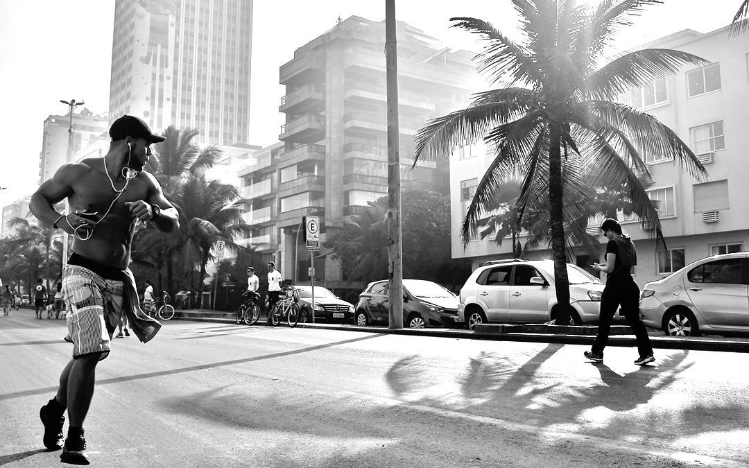 Exercises to Boost Libido, black and white image of a Man running in LA with his shirt off