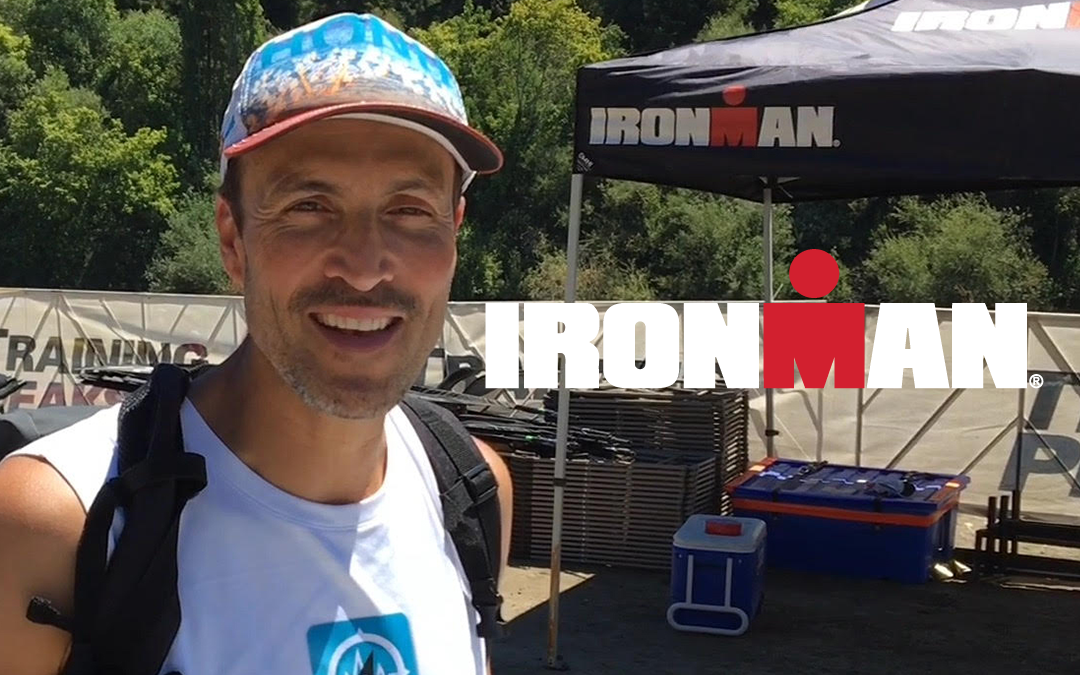 Myles Spar Ironman, image of myles during his IronMan with the logo graphic next to him
