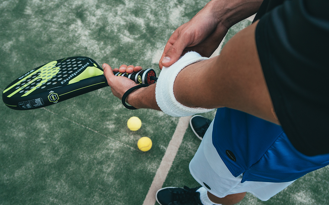 Design a Nutrition and Fitness Program for Your Genes, image of a tennis player moving a arm band