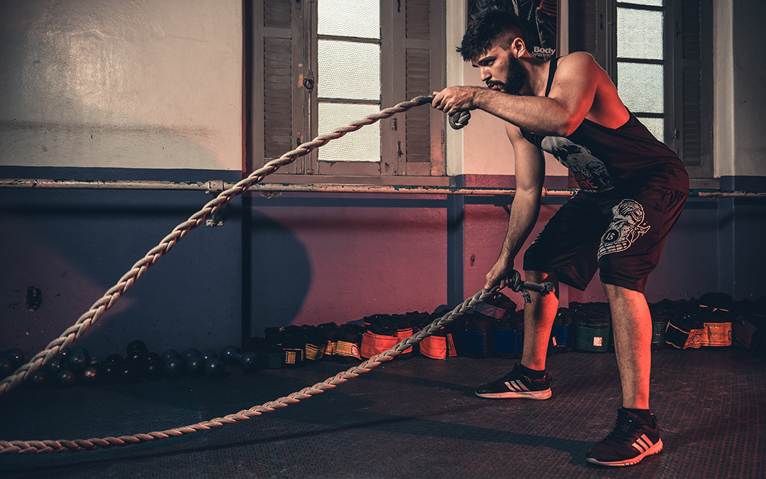 What Supplements Should I Take to Help My Overall Training?, image of a guy working out with ropes