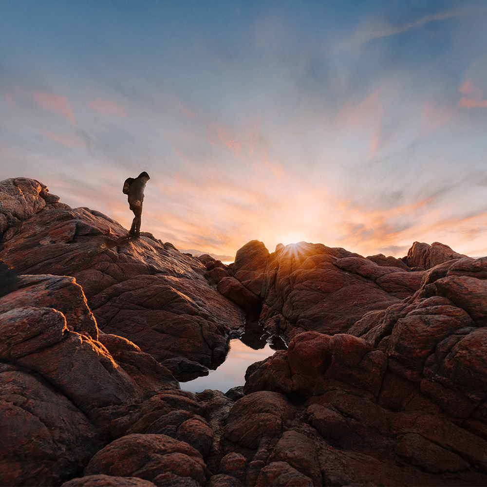 The Power of Moments, image of a man camping during a sunset